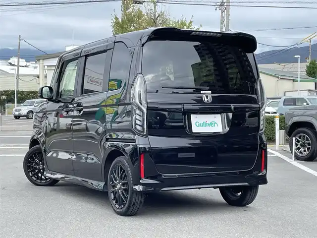 ホンダ Ｎ ＢＯＸ カスタム L ターボ 長野県 2023(令5)年 2.9万km クリスタルブラックパール 純正９型メモリナビ(AM/FM/TV/Bluetooth/DVD)/ターボ過給機/バックカメラ/純正15インチAW/Bluetooth/フルセグTV/ETC/前後ドライブレコーダー/両側電動スライドドア/ハーフレザーシート/前席シートヒーター/後方コーナーセンサー/アダプティブクルーズコントロール/プリクラッシュセーフティ/レーンキープアシスト/レーン逸脱警報装置/空気清浄/ＵＳＢ入力端子/ウィンカーミラー/パドルシフト/ＭＴモード付ＡＴ/革巻きステアリング/ステアリングスイッチ/純正エアロパーツ/純正フロアマット/純正ＬＥＤライト/フォグランプ/オートライト/アダプティブハイビームシステム/エアバック(Ｗ＋サイド＋カーテン)/プッシュスタート/オートエアコン/アイドリングストップ/スマートキー