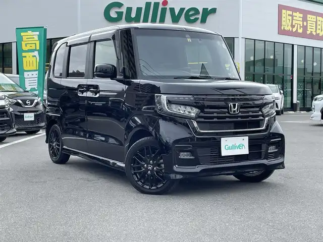 ホンダ Ｎ ＢＯＸ カスタム L ターボ 長野県 2023(令5)年 2.9万km クリスタルブラックパール 純正９型メモリナビ(AM/FM/TV/Bluetooth/DVD)/ターボ過給機/バックカメラ/純正15インチAW/Bluetooth/フルセグTV/ETC/前後ドライブレコーダー/両側電動スライドドア/ハーフレザーシート/前席シートヒーター/後方コーナーセンサー/アダプティブクルーズコントロール/プリクラッシュセーフティ/レーンキープアシスト/レーン逸脱警報装置/空気清浄/ＵＳＢ入力端子/ウィンカーミラー/パドルシフト/ＭＴモード付ＡＴ/革巻きステアリング/ステアリングスイッチ/純正エアロパーツ/純正フロアマット/純正ＬＥＤライト/フォグランプ/オートライト/アダプティブハイビームシステム/エアバック(Ｗ＋サイド＋カーテン)/プッシュスタート/オートエアコン/アイドリングストップ/スマートキー