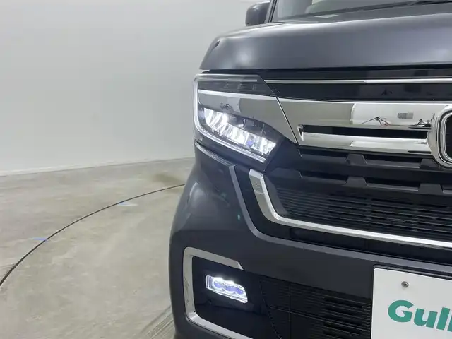 ホンダ Ｎ ＢＯＸ カスタム L 岡山県 2022(令4)年 2.1万km メテオロイドグレーメタリック 9インチフローティングナビ/（MDV-M909HDF）/・FM/AM/Bluetooth/フルセグ/CD/DVD/HDMI/バックカメラ/・フロントカメラ/シートヒーター/片側パワースライドドア/ホンダセンシング/・衝突軽減ブレーキ/・車線逸脱警報/・アダプティブクルーズコントロール/・オートハイビーム/・バックソナー/純正フロアマット/LEDヘッドライト/純正アルミ/後席サンシェード/シートバックテーブル/新車保証書/取扱説明書/スペアキー×１
