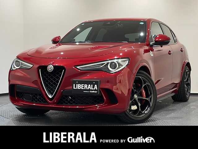 アルファロメオ ステルヴィオ クアドリフォリオ 新潟県 2019(令1)年 3.7万km 赤 クアドリフォリオ専用エクステリア/クアドリフォリオ専用スポーツブレーキ /クアドリフォリオエンブレム/クアドリフォリオ専用スポーツレザー/アルカンターラシート/クアドリフォリオ専用スポーツレザーステアリング/ALFA　DNA ドライブモードシステムRACEモード付き/ツインデュアルエキゾーストパイプ/パドルシフト/インテリアカラー　ブラック542/コンペティツィオーネ レッド　受注生産カラー/harman/kardonプレミアムオーディオシステム/Connect システム　8.8インチタッチディスプレイ/Bluetooth/Apple CarPlay/Android Auto/アダプティブクルーズコントロール/レーンキーピングアシスト/アクティブブラインドスポットアシスト/ヒルディセントコントロール/ステアリングヒーター /シートヒーター/カーボンパネル/キセノンヘッドライト/オートハイビーム/アンビエントライト/ETC2.0