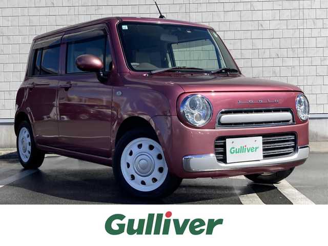 スズキ ラパン ショコラ G 静岡県 2013(平25)年 0.5万km カシスピンクパールメタリック 社外メモリーナビ/フルセグＴＶ/ＥＴＣ/バックモニター/レザーシート/ＨＩＤヘッドライト/純正１４インチアルミホイール/スマートキー/プッシュスタート/革巻きステアリング/アイドリングストップ