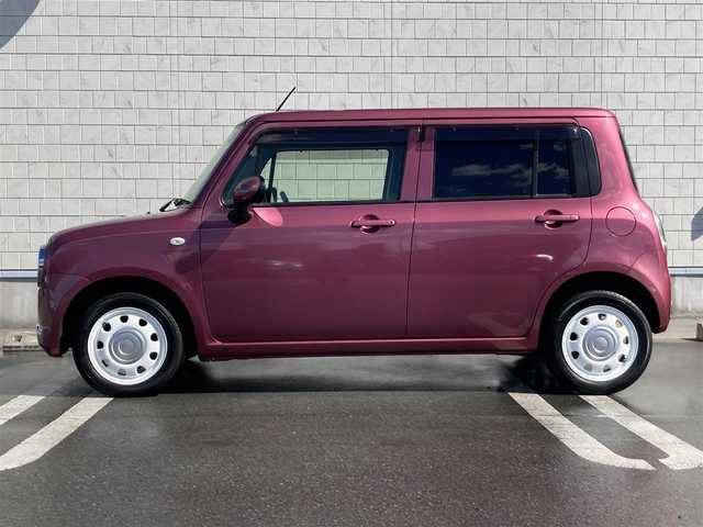 スズキ ラパン ショコラ G 静岡県 2013(平25)年 0.5万km カシスピンクパールメタリック 社外メモリーナビ/フルセグＴＶ/ＥＴＣ/バックモニター/レザーシート/ＨＩＤヘッドライト/純正１４インチアルミホイール/スマートキー/プッシュスタート/革巻きステアリング/アイドリングストップ