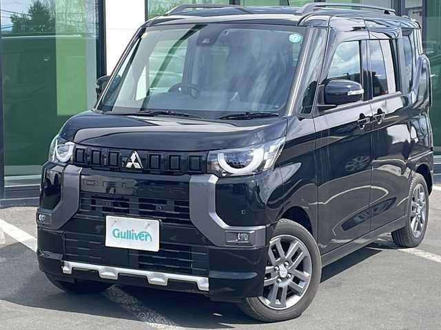 三菱 デリカミニ G プレミアム 道東・釧路十勝 2023(令5)年 2.6万km アメジストブラック ・4WD/・社外SDナビ/(CD・DVD・フルセグ・BT・SD・iPod・FM・AM)/・全方位カメラ/・MIPILOT/・スマートキー×2/・プッシュスタート/・ダウンヒルアシスト/・両側パワースライドドア/・ステアリングヒーター/・シートヒーター/・純正エンジンスターター/・LEDヘッドライト/・フォグライト/・オートライト/・ルーフレール/・ステアリングスイッチ/・社外フロアマット/・ドアバイザー/・電格ウィンカーミラー