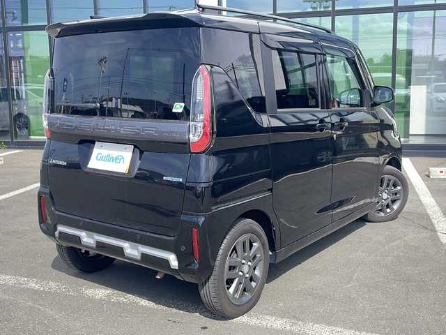 三菱 デリカミニ G プレミアム 道東・釧路十勝 2023(令5)年 2.6万km アメジストブラック ・4WD/・社外SDナビ/(CD・DVD・フルセグ・BT・SD・iPod・FM・AM)/・全方位カメラ/・MIPILOT/・スマートキー×2/・プッシュスタート/・ダウンヒルアシスト/・両側パワースライドドア/・ステアリングヒーター/・シートヒーター/・純正エンジンスターター/・LEDヘッドライト/・フォグライト/・オートライト/・ルーフレール/・ステアリングスイッチ/・社外フロアマット/・ドアバイザー/・電格ウィンカーミラー