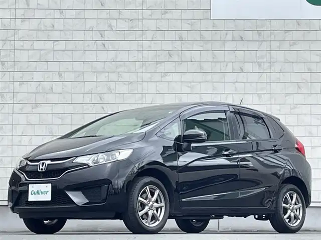 ホンダ フィット 13G Lパッケージ 岩手県 2017(平29)年 11.6万km クリスタルブラックパール 4WD/社外ＳＤナビ/→ワンセグTV/ＣＤ/FM/AM/クルーズコントロール/CTBA/ESC/ＥＴＣ/プッシュスタート/オートライト/スマートキー/〇電動格納ミラー/〇ウィンカーミラー/〇ドアバイザー/〇フロアマット/社外アルミホイール