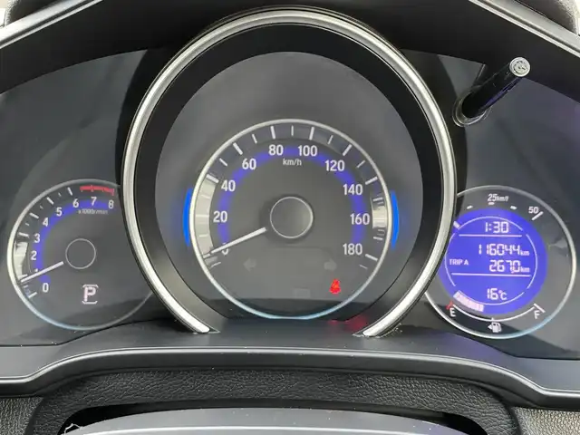ホンダ フィット 13G Lパッケージ 岩手県 2017(平29)年 11.6万km クリスタルブラックパール 4WD/社外ＳＤナビ/→ワンセグTV/ＣＤ/FM/AM/クルーズコントロール/CTBA/ESC/ＥＴＣ/プッシュスタート/オートライト/スマートキー/〇電動格納ミラー/〇ウィンカーミラー/〇ドアバイザー/〇フロアマット/社外アルミホイール