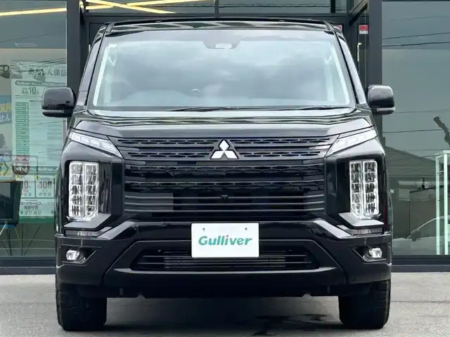三菱 デリカＤ：５ シャモニー 愛媛県 2024(令6)年 3.3万km 黒Ⅱ シャモニー専用撥水シート/DELTAFORCE製18インチアルミホイール/純正11インチメモリナビ/CD/DVD/BT/MSV/iPod/DTV/HDMI/バックカメラ/ETC/パドルシフト/レーダークルーズコントロール/レーンキープアシストシステム/衝突被害軽減ブレーキ/D席パワーシート/D＋N席シートヒーター/両側電動スライドドア/電動サイドステップ/LEDヘッドライト/オートライト/オートマチックハイビーム/電動リアゲート/革巻きステアリング/ステアリングスイッチ/純正フロアマット/ドアバイザー/プッシュスタート/スマートキー