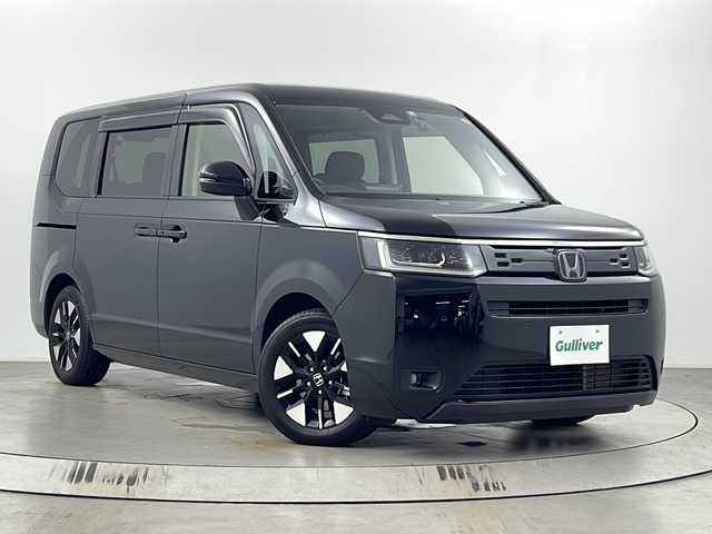 ホンダ ステップワゴン eHEV エアー 埼玉県 2022(令4)年 4万km クリスタルブラックパール 純正ナビ（Ｂｌｕｅｔｏｏｔｈ・ＳＤ・ＤＶＤ・ＣＤ・ＵＳＢ・ＴＶ）/前後ドライブレコーダー/全方位カメラ/ビルトインＥＴＣ/両側パワースライドドア/衝突軽減ブレーキ/先行車発進お知らせ機能/標識認識機能/横滑り防止装置/盗難防止装置/コーナーセンサー/パーキングセンサー/レーンキープアシスト/純正フロアマット/純正アルミホイール/純正ドアバイザー/ウィンカーミラー/フロントフォグランプ