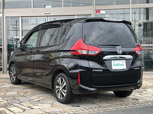 ホンダ フリード ハイブリット EX 静岡県 2018(平30)年 8.4万km プレミアムスパークルブラックパール 純正ナビ/・（CD/DVD/ラジオ）/主要装備/・クルーズコントロール/・衝突軽減ブレーキ/・レーンキープアシスト/・両側パワースライドドア/・バックカメラ/・フリップダウンモニター/・フロントデフォッガー/・シートヒーター/・ステアリングリモコン/・オートライト/・ETC