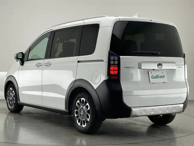 ホンダ フリード ハイブリット e:HEV クロスター 愛知県 2025(令7)年 0.1千km プラチナホワイトパール 登録済未使用車　純正９型ナビ　フルセグＴＶ　Ｂｌｕｅｔｏｏｔｈ　ＵＳＢ　ＢＳＭ　シートヒーター　ハーフレザー　両側パワースライドドア　ホンダセンシング　衝突軽減　追従クルコン　ＬＥＤオートライト　禁煙/e:HEV クロスター　2LE40P3　6人　9インチナビ　LXM-242ZFNI(207680円)