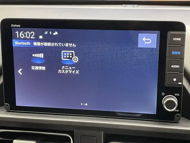 ホンダ フリード ハイブリット e:HEV クロスター 愛知県 2025(令7)年 0.1千km プラチナホワイトパール 登録済未使用車　純正９型ナビ　フルセグＴＶ　Ｂｌｕｅｔｏｏｔｈ　ＵＳＢ　ＢＳＭ　シートヒーター　ハーフレザー　両側パワースライドドア　ホンダセンシング　衝突軽減　追従クルコン　ＬＥＤオートライト　禁煙/e:HEV クロスター　2LE40P3　6人　9インチナビ　LXM-242ZFNI(207680円)