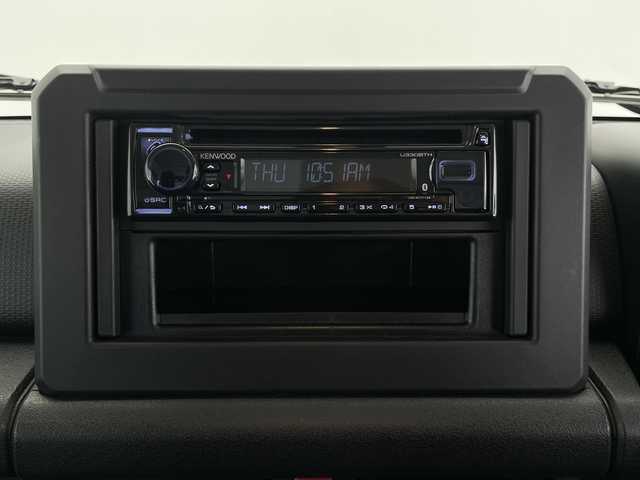 スズキ ジムニー XG 長野県 2023(令5)年 0.7万km シルキーシルバーメタリック 4WD/社外オーディオ（型番：U330BTH)/ETC/純正フロアマット/16インチ純正アルミホイール/盗難防止装置/ABS/横滑り防止装置/ダウンヒルアシストコントロール/オートライト/フォグランプ/マッドフラップ/ライトレベライザー/保証書/説明書/スペアキー