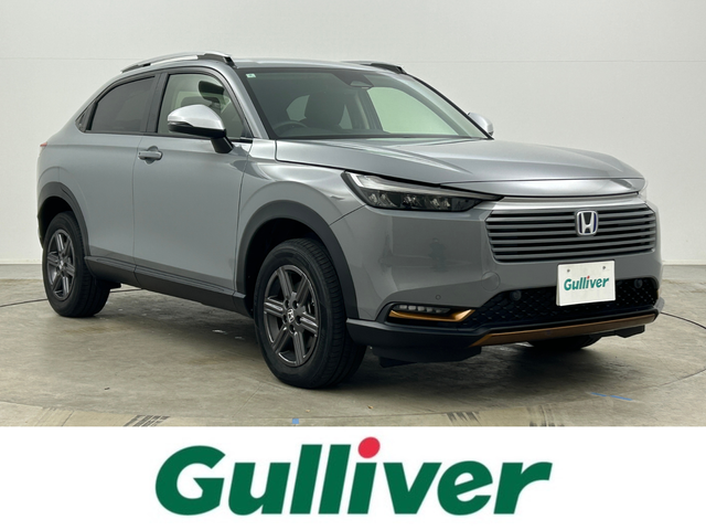 ホンダ ヴェゼル ハイブリッド e:HEV X HuNTパッケージ 岡山県 2024(令6)年 0.3万km グレー 純正９インチナビ　(VXU-２４５VZi)/【CD/DVD/BT/SD/フルセグ/Carplay】/ＬＥＤヘッドライト　/レーダークルーズコントロール/バックカメラ　/コーナーセンサー/オートハイビーム　/スマートキー　/スペアキー×1/レーンキープアシスト　/ミュージックサーバー　/フォグランプ/禁煙車/オートブレーキホールド/パドルシフト