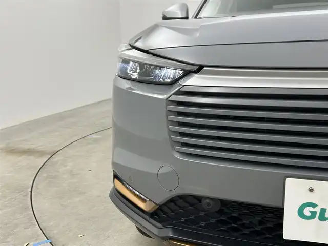 ホンダ ヴェゼル ハイブリッド e:HEV X HuNTパッケージ 岡山県 2024(令6)年 0.3万km グレー 純正９インチナビ　(VXU-２４５VZi)/【CD/DVD/BT/SD/フルセグ/Carplay】/ＬＥＤヘッドライト　/レーダークルーズコントロール/バックカメラ　/コーナーセンサー/オートハイビーム　/スマートキー　/スペアキー×1/レーンキープアシスト　/ミュージックサーバー　/フォグランプ/禁煙車/オートブレーキホールド/パドルシフト