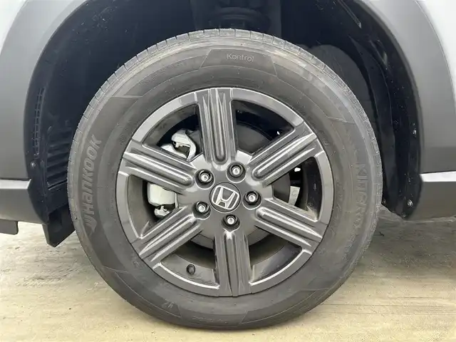 ホンダ ヴェゼル ハイブリッド e:HEV X HuNTパッケージ 岡山県 2024(令6)年 0.3万km グレー 純正９インチナビ　(VXU-２４５VZi)/【CD/DVD/BT/SD/フルセグ/Carplay】/ＬＥＤヘッドライト　/レーダークルーズコントロール/バックカメラ　/コーナーセンサー/オートハイビーム　/スマートキー　/スペアキー×1/レーンキープアシスト　/ミュージックサーバー　/フォグランプ/禁煙車/オートブレーキホールド/パドルシフト