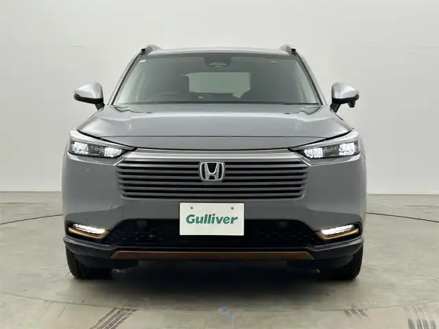 ホンダ ヴェゼル ハイブリッド e:HEV X HuNTパッケージ 岡山県 2024(令6)年 0.3万km グレー 純正９インチナビ　(VXU-２４５VZi)/【CD/DVD/BT/SD/フルセグ/Carplay】/ＬＥＤヘッドライト　/レーダークルーズコントロール/バックカメラ　/コーナーセンサー/オートハイビーム　/スマートキー　/スペアキー×1/レーンキープアシスト　/ミュージックサーバー　/フォグランプ/禁煙車/オートブレーキホールド/パドルシフト