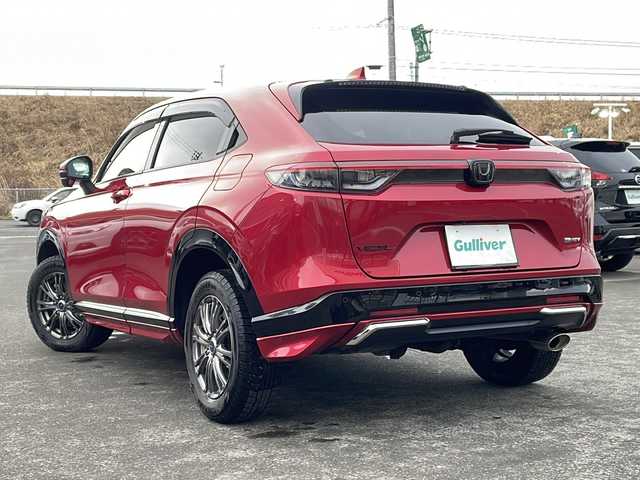 ホンダ ヴェゼル ハイブリッド e:HEV Z 青森県 2021(令3)年 5.1万km プレミアムクリスタルレッドM ・寒冷地仕様/・4WD/・純正ナビ/・AM/FM/BT/フルセグ/・全方位バックカメラ/・横滑り防止装置/・衝突被害軽減ブレーキ/・レーンキープアシスト/・クルーズコントロール追従/・ブライドスポットモニター/・コーナーセンサー/・パドルシフト/・前後ドライブレコーダー/・ETC2.0/・ハーフレザーシート/・LEDヘッドライト/・パワーバックドア/・シートヒーター/・ステアリングヒーター/・ワイヤレス充電/・オートライト/・USBソケット/・純正フロアマット/・純正夏タイヤ16インチAW積込/・保証書/取説