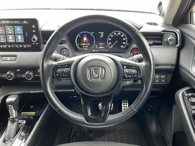 ホンダ ヴェゼル ハイブリッド e:HEV Z 青森県 2021(令3)年 5.1万km プレミアムクリスタルレッドM ・寒冷地仕様/・4WD/・純正ナビ/・AM/FM/BT/フルセグ/・全方位バックカメラ/・横滑り防止装置/・衝突被害軽減ブレーキ/・レーンキープアシスト/・クルーズコントロール追従/・ブライドスポットモニター/・コーナーセンサー/・パドルシフト/・前後ドライブレコーダー/・ETC2.0/・ハーフレザーシート/・LEDヘッドライト/・パワーバックドア/・シートヒーター/・ステアリングヒーター/・ワイヤレス充電/・オートライト/・USBソケット/・純正フロアマット/・純正夏タイヤ16インチAW積込/・保証書/取説