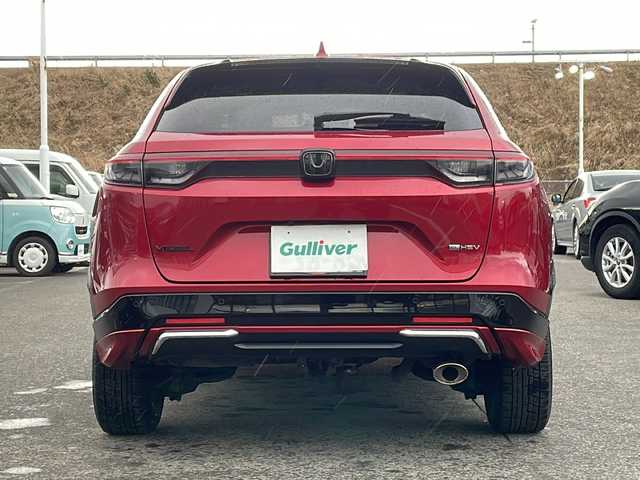 ホンダ ヴェゼル ハイブリッド e:HEV Z 青森県 2021(令3)年 5.1万km プレミアムクリスタルレッドM ・寒冷地仕様/・4WD/・純正ナビ/・AM/FM/BT/フルセグ/・全方位バックカメラ/・横滑り防止装置/・衝突被害軽減ブレーキ/・レーンキープアシスト/・クルーズコントロール追従/・ブライドスポットモニター/・コーナーセンサー/・パドルシフト/・前後ドライブレコーダー/・ETC2.0/・ハーフレザーシート/・LEDヘッドライト/・パワーバックドア/・シートヒーター/・ステアリングヒーター/・ワイヤレス充電/・オートライト/・USBソケット/・純正フロアマット/・純正夏タイヤ16インチAW積込/・保証書/取説