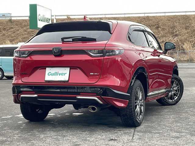 ホンダ ヴェゼル ハイブリッド e:HEV Z 青森県 2021(令3)年 5.1万km プレミアムクリスタルレッドM ・寒冷地仕様/・4WD/・純正ナビ/・AM/FM/BT/フルセグ/・全方位バックカメラ/・横滑り防止装置/・衝突被害軽減ブレーキ/・レーンキープアシスト/・クルーズコントロール追従/・ブライドスポットモニター/・コーナーセンサー/・パドルシフト/・前後ドライブレコーダー/・ETC2.0/・ハーフレザーシート/・LEDヘッドライト/・パワーバックドア/・シートヒーター/・ステアリングヒーター/・ワイヤレス充電/・オートライト/・USBソケット/・純正フロアマット/・純正夏タイヤ16インチAW積込/・保証書/取説