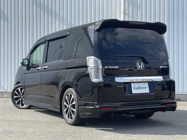 ホンダ ステップワゴン スパーダ Z 福岡県 2014(平26)年 9.2万km プレミアムスパークルブラックパール (株)IDOMが運営する【じしゃロン八幡西店】の自社ローン専用車両になります。こちらは現金またはオートローンご利用時の価格です。自社ローンご希望の方は別途その旨お申付け下さい/フリップダウンモニター　/社外ナビ（ＡＶＩＣ－ＨＲＺ９００）　/バックカメラ/両側パワースライドドア　　/ＨＩＤヘッドライト　クルーズコントロール　/パドルシフト　/スマートキー　/ＥＴＣ　/オートライト　/純正ＡＷ