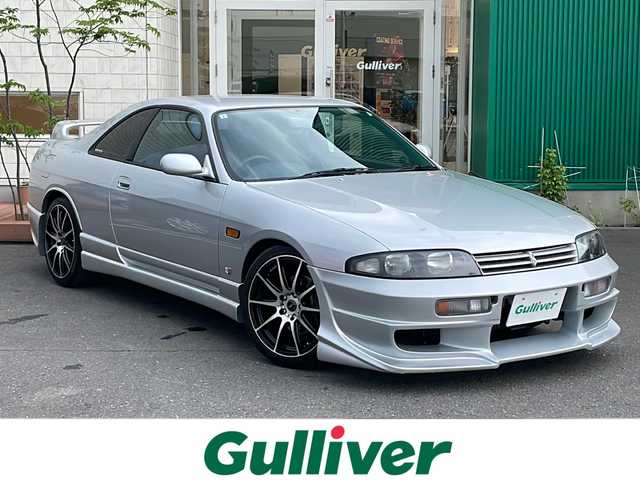 日産 スカイライン GTS25t タイプM エアロ 青森県 1995(平7)年 9.2万km プラチナシルバー 5速マニュアル車(乗換)/社外エアロパーツ/社外18インチアルミ/社外マフラー/社外足回り/社外ステアリング/社外シフトノブ/純正オーディオ/純正フロアマット/H31.3.7 63025km時タイミングベルト交換シール有/ディーラー記録簿25枚有/純正スペアキー有/保証書有