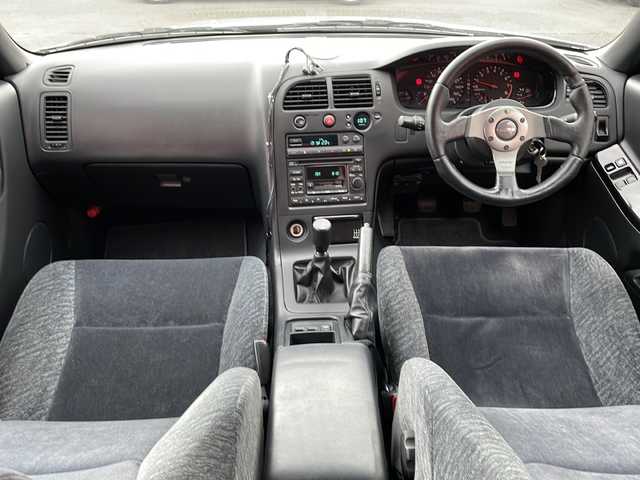 日産 スカイライン GTS25t タイプM エアロ 青森県 1995(平7)年 9.2万km プラチナシルバー 5速マニュアル車(乗換)/社外エアロパーツ/社外18インチアルミ/社外マフラー/社外足回り/社外ステアリング/社外シフトノブ/純正オーディオ/純正フロアマット/H31.3.7 63025km時タイミングベルト交換シール有/ディーラー記録簿25枚有/純正スペアキー有/保証書有