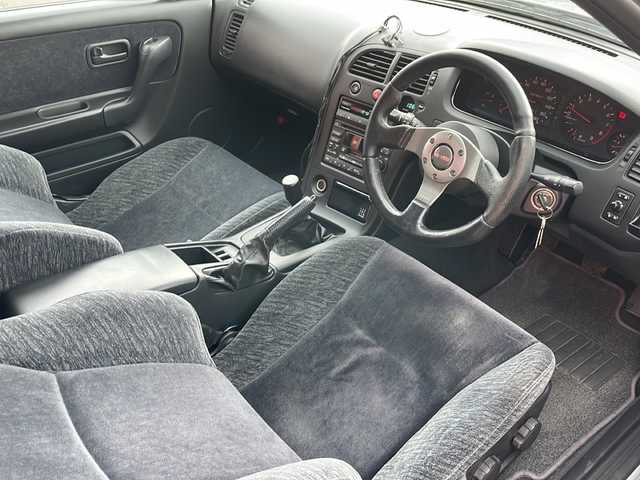 日産 スカイライン GTS25t タイプM エアロ 青森県 1995(平7)年 9.2万km プラチナシルバー 5速マニュアル車(乗換)/社外エアロパーツ/社外18インチアルミ/社外マフラー/社外足回り/社外ステアリング/社外シフトノブ/純正オーディオ/純正フロアマット/H31.3.7 63025km時タイミングベルト交換シール有/ディーラー記録簿25枚有/純正スペアキー有/保証書有
