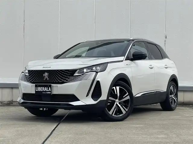 プジョー ３００８ GT ハイブリッド4 東京都 2021(令3)年 3.9万km パール 純正ナビ/360°カメラ/AppleCarPlay/Bluetooth接続/前後ドライブレコーダー/アルカンターラ貼インパネ加飾/グレー合皮/アルカンターラシート/アダプティブクルーズコントロール/カーテンエアバック/サイドエアバック