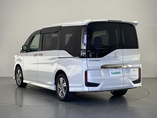 ホンダ ステップワゴン スパーダ eHEV G EXホンダS 長野県 2020(令2)年 5.6万km プラチナホワイトパール 純正9インチナビ&フルセグTV&CD&DVD&USB&BT/ホンダセンシング/アダプティブクルーズコントロール/レーンキープアシスト/車線逸脱警報/衝突軽減ブレーキ/先行車発進告知/標識認識機能/社外前後ドライブレコーダー/両側パワースライドドア/ハーフレザーシート/ステアリングスイッチ/2列目サンシェード/バックカメラ/ビルトインETC2.0/LEDヘッドライト/オートライト/電動格納ミラー/ウィンカーミラー/ドアミラーヒーター/電動ホールド/ブレーキホールド/純正16インチAW装着/純正フロアマット/純正ドアバイザー/プッシュスタート/スマートキー