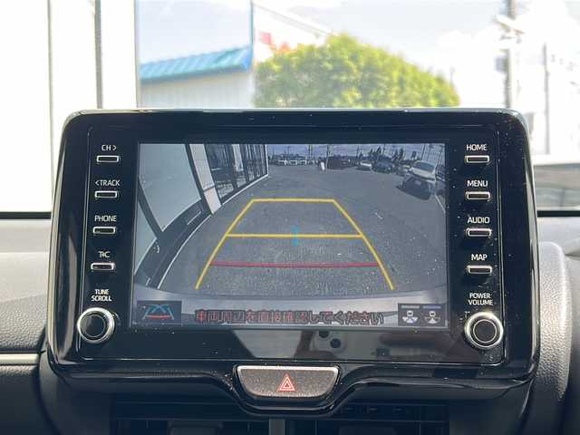 トヨタ ヤリス ハイブリッド G 山形県 2022(令4)年 1.1万km アバンギャルドブロンズメタリック 4WD/衝突被害軽減システム/トヨタセーフティーセンス/純正ナビ/BSM/レーダークルーズコントロール/コーナーセンサー/純正ドライブレコーダー/ステアリングスイッチ/寒冷地仕様/フロントワイパーデアイサー/ビルトインETC/100V充電/純正フロアマット/電動格納ミラー/ウィンカーミラー/ドアバイザー/社外AW＋スタッドレス(6mm・R15)車載/スマートキー/スペアキー