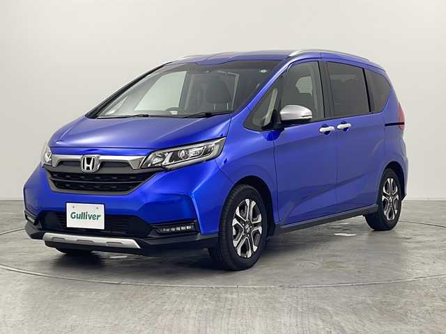 ホンダ フリード クロスター 群馬県 2023(令5)年 0.6万km プレミアムクリスタルブルークリスタル LEDアダプティブコーナリングライト/＝＝＝＝＝＝/純正ナビ(AM/FM/Bluetooth/フルセグTV/USB)/バックモニター/Honda SENSING/ ・衝突軽減ブレーキ/ ・路外逸脱抑制機能/ ・先行車発進お知らせ機能/ ・アダプティブクルーズコントロール/ ・車線維持支援システム/ ・標識認識機能/ ・オートハイビーム/D/N席シートヒーター/両側パワースライドドア/ビルトインETC/LEDヘッドランプ
