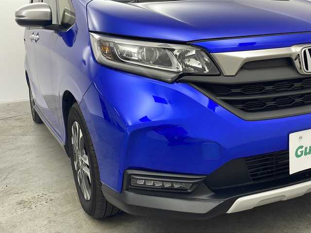 ホンダ フリード クロスター 群馬県 2023(令5)年 0.6万km プレミアムクリスタルブルークリスタル LEDアダプティブコーナリングライト/＝＝＝＝＝＝/純正ナビ(AM/FM/Bluetooth/フルセグTV/USB)/バックモニター/Honda SENSING/ ・衝突軽減ブレーキ/ ・路外逸脱抑制機能/ ・先行車発進お知らせ機能/ ・アダプティブクルーズコントロール/ ・車線維持支援システム/ ・標識認識機能/ ・オートハイビーム/D/N席シートヒーター/両側パワースライドドア/ビルトインETC/LEDヘッドランプ
