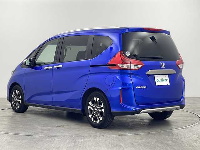 ホンダ フリード クロスター 群馬県 2023(令5)年 0.6万km プレミアムクリスタルブルークリスタル LEDアダプティブコーナリングライト/＝＝＝＝＝＝/純正ナビ(AM/FM/Bluetooth/フルセグTV/USB)/バックモニター/Honda SENSING/ ・衝突軽減ブレーキ/ ・路外逸脱抑制機能/ ・先行車発進お知らせ機能/ ・アダプティブクルーズコントロール/ ・車線維持支援システム/ ・標識認識機能/ ・オートハイビーム/D/N席シートヒーター/両側パワースライドドア/ビルトインETC/LEDヘッドランプ