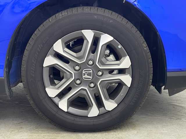 ホンダ フリード クロスター 群馬県 2023(令5)年 0.6万km プレミアムクリスタルブルークリスタル LEDアダプティブコーナリングライト/＝＝＝＝＝＝/純正ナビ(AM/FM/Bluetooth/フルセグTV/USB)/バックモニター/Honda SENSING/ ・衝突軽減ブレーキ/ ・路外逸脱抑制機能/ ・先行車発進お知らせ機能/ ・アダプティブクルーズコントロール/ ・車線維持支援システム/ ・標識認識機能/ ・オートハイビーム/D/N席シートヒーター/両側パワースライドドア/ビルトインETC/LEDヘッドランプ