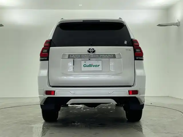 トヨタ ランドクルーザー プラド TX 福井県 2023(令5)年 1.7万km ホワイトパールクリスタルシャイン ・4WD/・サンルーフ/・ルーフレール/・モデリスタエアロ/・ブラックエディション用18インチAW/・トヨタセーフティセンス/・プリクラッシュセーフティ/・レーダークルーズコントロール/・社外9インチSDナビ/(DVD.CD.SD.Bluetooth.フルセグTV)/・バックカメラ/・LEDオートライト/オートハイビーム/・ETC/・トノカバー/・スペアキー×1/・取説/保証書