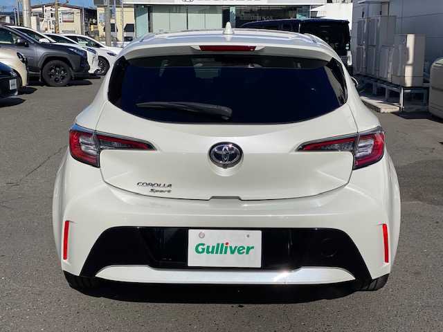 トヨタ カローラ スポーツ G 青森県 2019(令1)年 2.2万km ホワイトパールクリスタルシャイン ４WD/純正ナビ(BT/フルセグ/DVD/CD/ラジオ)/寒冷地仕様/ステアリングヒーター/バックカメラ/フロントワイパーデアイサー/トヨタプリクラッシュセーフティ/アダプティブクルーズコントロール/オートマチックハイビーム/レーンアシスト/オートライト/LEDヘッドライト/ETC/ヘッドライトレベライザー/ドライブレコーダー(前方)/新車時保証書/取扱説明書