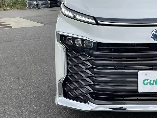 トヨタ ヴォクシー ハイブリッド S－Z 山形県 2025(令7)年 0.1千km ホワイトパールクリスタルシャイン トヨタセーフティセンス/純正ディスプレイオーディオ/　　【CD　DVD　BT　フルセグ　USB】/バックカメラ/両側パワースライドドア/レーダークルーズコントロール/LEDオートライト/ハーフレザーシート/シートヒーター/純正17インチアルミホイール/100V電源/コーナーセンサー/リアオートエアコン/ステアリングスイッチ/スマートキー/ETC2.0