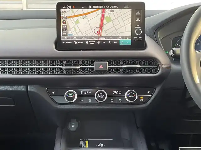 ホンダ ＺＲ－Ｖ ハイブリッド e:HEV Z 福岡県 2024(令6)年 0.6万km クリスタルブラックパール ワンオーナー/BOSEプレミアムサウンド/純正9インチディスプレイオーディオ/　(AM/FM/Bluetooth/フルセグTV/ナビ)/マルチビューカメラ/バック/フロント/サイドカメラ/ホンダセンシング/・衝突軽減ブレーキ/・踏み間違い衝突軽減/・路外逸脱抑制/・歩行者事故低減ステアリング/・先行車発進お知らせ/・標識認識/・オートハイビーム/・アダプティブドライビングビーム/・ブラインドスポットインフォメーション/・パーキングセンサー/・アダプティブクルーズコントロール(渋滞追従機能付)/・車線維持支援/・トラフィックジャムアシスト/横滑り防止/ヒルディセントコントロール/純正18インチアルミホイール/パワーバックドア/パドルシフト/革巻きステアリング/ステアリングスイッチ/ステアリングヒーター/茶色レザーシート/シートメモリー(D)/シートヒーター付きパワーシート(D/N)/コムテック前後ドライブレコーダー【AG425-DRC】/純正ナビ連動型ビルトインETC2.0/純正フロアマット/置くだけ充電/USB端子、タイプC端子/ISOFIX/スペアキー×1/保証書/取扱説明書/ナビ取扱説明書