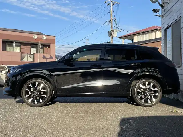 ホンダ ＺＲ－Ｖ ハイブリッド e:HEV Z 福岡県 2024(令6)年 0.6万km クリスタルブラックパール ワンオーナー/BOSEプレミアムサウンド/純正9インチディスプレイオーディオ/　(AM/FM/Bluetooth/フルセグTV/ナビ)/マルチビューカメラ/バック/フロント/サイドカメラ/ホンダセンシング/・衝突軽減ブレーキ/・踏み間違い衝突軽減/・路外逸脱抑制/・歩行者事故低減ステアリング/・先行車発進お知らせ/・標識認識/・オートハイビーム/・アダプティブドライビングビーム/・ブラインドスポットインフォメーション/・パーキングセンサー/・アダプティブクルーズコントロール(渋滞追従機能付)/・車線維持支援/・トラフィックジャムアシスト/横滑り防止/ヒルディセントコントロール/純正18インチアルミホイール/パワーバックドア/パドルシフト/革巻きステアリング/ステアリングスイッチ/ステアリングヒーター/茶色レザーシート/シートメモリー(D)/シートヒーター付きパワーシート(D/N)/コムテック前後ドライブレコーダー【AG425-DRC】/純正ナビ連動型ビルトインETC2.0/純正フロアマット/置くだけ充電/USB端子、タイプC端子/ISOFIX/スペアキー×1/保証書/取扱説明書/ナビ取扱説明書