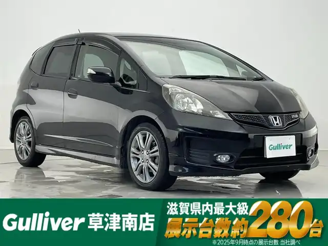 ホンダ フィット RS 滋賀県 2011(平23)年 6.5万km クリスタルブラックパール ビルトインETC/本革巻きステアリング/パドルシフト/ステアリングスイッチ/ドライブレコーダー/電動格納ミラー/ドアバイザー/リアワイパー/純正フロアマット/純正16インチアルミホイール/スペアキー/リモコンキー