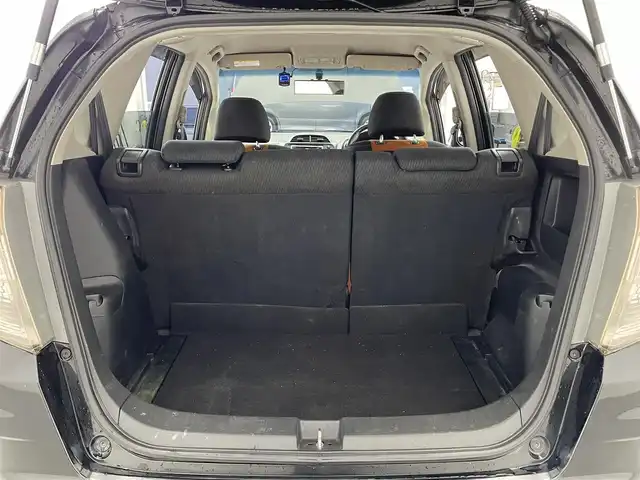 ホンダ フィット RS 滋賀県 2011(平23)年 6.5万km クリスタルブラックパール ビルトインETC/本革巻きステアリング/パドルシフト/ステアリングスイッチ/ドライブレコーダー/電動格納ミラー/ドアバイザー/リアワイパー/純正フロアマット/純正16インチアルミホイール/スペアキー/リモコンキー