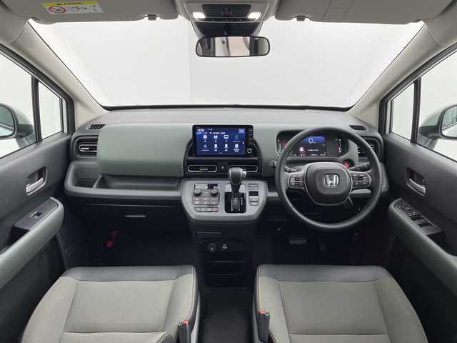 ホンダ フリード ハイブリット e:HEV クロスター 愛知県 2025(令7)年 0.1千km プラチナホワイトパール 登録済未使用車/純正9インチメモリナビ　LXM-242ZFNI/フルセグTV/USB/BT/AM/FM/Apple Car Play/Android Auto/バックカメラ/ハーフレザーシート/シートヒーター　D/N席/ホンダセンシング/衝突軽減ブレーキ（CMBS/車線維持支援システム（LKAS/路外逸脱抑制機能/先行車発進お知らせ機能/渋滞追従機能付アダプティブクルーズコントロール（ACC/オートハイビーム（AHB/誤発進抑制機能/ブラインドスポットインフォメーション（BSI/標識認識/リアクーラー機能/スマートキー/プッシュスタート/ルーフレール/USBポート/革巻きステアリング/LEDオートライト/LEDフォグランプ/電動格納ミラー/純正15インチAW