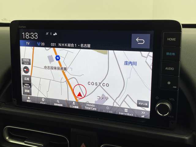 ホンダ フリード ハイブリット e:HEV クロスター 愛知県 2025(令7)年 0.1千km プラチナホワイトパール 登録済未使用車/純正9インチメモリナビ　LXM-242ZFNI/フルセグTV/USB/BT/AM/FM/Apple Car Play/Android Auto/バックカメラ/ハーフレザーシート/シートヒーター　D/N席/ホンダセンシング/衝突軽減ブレーキ（CMBS/車線維持支援システム（LKAS/路外逸脱抑制機能/先行車発進お知らせ機能/渋滞追従機能付アダプティブクルーズコントロール（ACC/オートハイビーム（AHB/誤発進抑制機能/ブラインドスポットインフォメーション（BSI/標識認識/リアクーラー機能/スマートキー/プッシュスタート/ルーフレール/USBポート/革巻きステアリング/LEDオートライト/LEDフォグランプ/電動格納ミラー/純正15インチAW