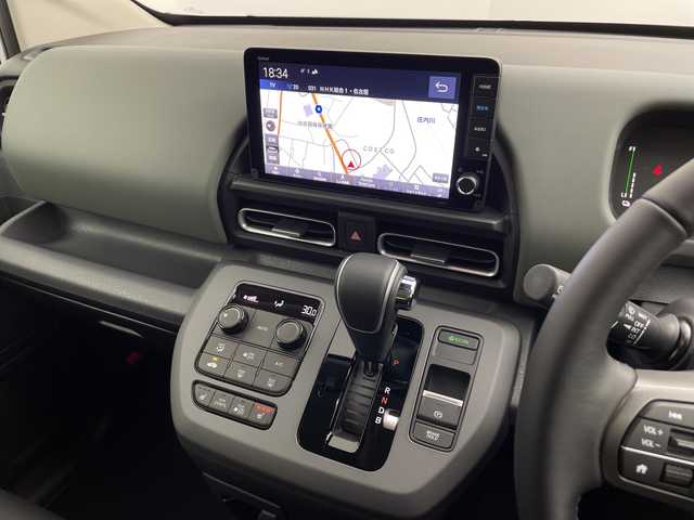 ホンダ フリード ハイブリット e:HEV クロスター 愛知県 2025(令7)年 0.1千km プラチナホワイトパール 登録済未使用車/純正9インチメモリナビ　LXM-242ZFNI/フルセグTV/USB/BT/AM/FM/Apple Car Play/Android Auto/バックカメラ/ハーフレザーシート/シートヒーター　D/N席/ホンダセンシング/衝突軽減ブレーキ（CMBS/車線維持支援システム（LKAS/路外逸脱抑制機能/先行車発進お知らせ機能/渋滞追従機能付アダプティブクルーズコントロール（ACC/オートハイビーム（AHB/誤発進抑制機能/ブラインドスポットインフォメーション（BSI/標識認識/リアクーラー機能/スマートキー/プッシュスタート/ルーフレール/USBポート/革巻きステアリング/LEDオートライト/LEDフォグランプ/電動格納ミラー/純正15インチAW