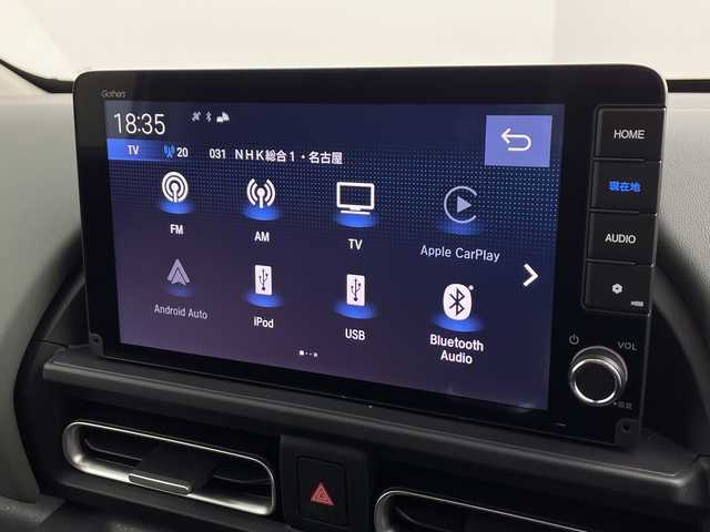 ホンダ フリード ハイブリット e:HEV クロスター 愛知県 2025(令7)年 0.1千km プラチナホワイトパール 登録済未使用車/純正9インチメモリナビ　LXM-242ZFNI/フルセグTV/USB/BT/AM/FM/Apple Car Play/Android Auto/バックカメラ/ハーフレザーシート/シートヒーター　D/N席/ホンダセンシング/衝突軽減ブレーキ（CMBS/車線維持支援システム（LKAS/路外逸脱抑制機能/先行車発進お知らせ機能/渋滞追従機能付アダプティブクルーズコントロール（ACC/オートハイビーム（AHB/誤発進抑制機能/ブラインドスポットインフォメーション（BSI/標識認識/リアクーラー機能/スマートキー/プッシュスタート/ルーフレール/USBポート/革巻きステアリング/LEDオートライト/LEDフォグランプ/電動格納ミラー/純正15インチAW