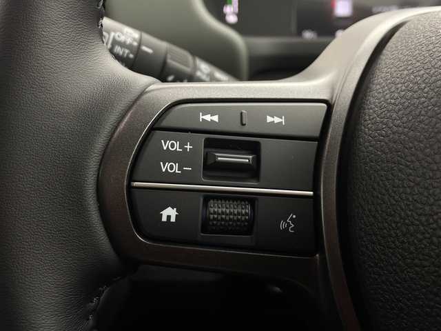 ホンダ フリード ハイブリット e:HEV クロスター 愛知県 2025(令7)年 0.1千km プラチナホワイトパール 登録済未使用車/純正9インチメモリナビ　LXM-242ZFNI/フルセグTV/USB/BT/AM/FM/Apple Car Play/Android Auto/バックカメラ/ハーフレザーシート/シートヒーター　D/N席/ホンダセンシング/衝突軽減ブレーキ（CMBS/車線維持支援システム（LKAS/路外逸脱抑制機能/先行車発進お知らせ機能/渋滞追従機能付アダプティブクルーズコントロール（ACC/オートハイビーム（AHB/誤発進抑制機能/ブラインドスポットインフォメーション（BSI/標識認識/リアクーラー機能/スマートキー/プッシュスタート/ルーフレール/USBポート/革巻きステアリング/LEDオートライト/LEDフォグランプ/電動格納ミラー/純正15インチAW