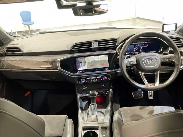 アウディ ＲＳＱ３ スポーツバック 新潟県 2021(令3)年 2.7万km グレー Bang & Olufsen 3Dサウンドシステム/カーボンエンジンカバー/RS スポーツエキゾーストシステム/デコラティブパネル カーボン/カラードブレーキキャリパーレッド/バーチャルコックピット/MMIナビゲーション/・Apple Car Play/・Android Auto/・TV/アダプティブクルーズアシスト/アダプティブクルーズコントロール/アウディパーキングシステム/ヒルディセントアシスト/Audi ユニバーサルトラフィックレコーダー/アンビエントライト/ETC2.0/シートヒーター/ワイヤレス充電