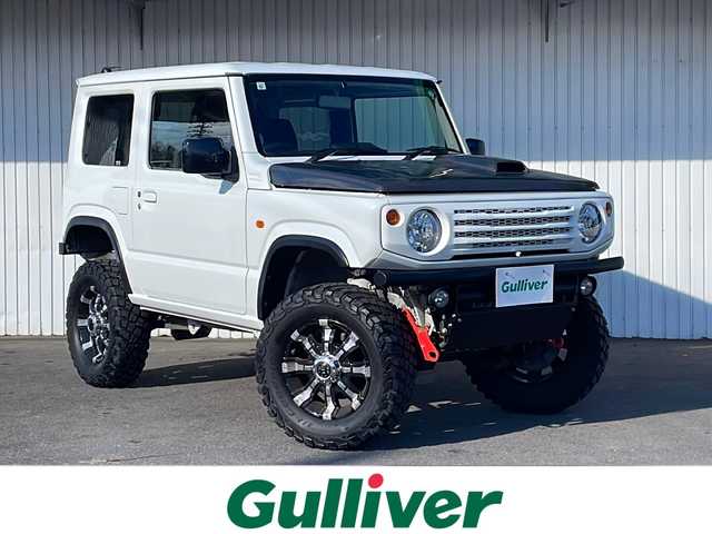 スズキ ジムニー XL 長野県 2019(令1)年 3.8万km スペリアホワイト 純正8型ナビフルセグTV/社外16インチアルミ/ＢＦグッドリッチＭ／Ｔ/リフトアップ/ラテラルロッド/社外ボンネット/社外マフラー/社外前後バンパー/社外グリル/社外テール/社外スキッドプレート/社外デフガード/社外オーバーフェンダー/バックカメラ/レザー調シートカバー/プッシュスタート/ワンオーナー