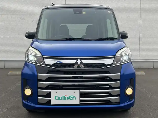 三菱 ｅＫスペース カスタムT セーフティプラスED 秋田県 2018(平30)年 4.2万km ライトニングブルーマイカ 4WD/ターボ/純正メモリナビ/　【フルセグ/CD/DVD/USB/SD/BT/MSV】/バックカメラ・全周囲カメラ/純正エンジンスターター/装着：社外AWスタッドレスタイヤ 155/65/R14/車載：純正AWサマータイヤ 　　　165/55/R15/ステアリングスイッチ/クルーズコントロール/運転席シートヒーター/両側パワースライドドア/LEDヘッドライト（AUTO機能付き）・フォグランプ/オートマチックハイビーム/アイドリングストップ/衝突軽減システム/横滑り防止機能/レーンキープアシスト/パーキングアシスト/コーナーセンサー/リアサーキュレーター/リアサンシェード/純正フロアマット/純正ドアバイザー
